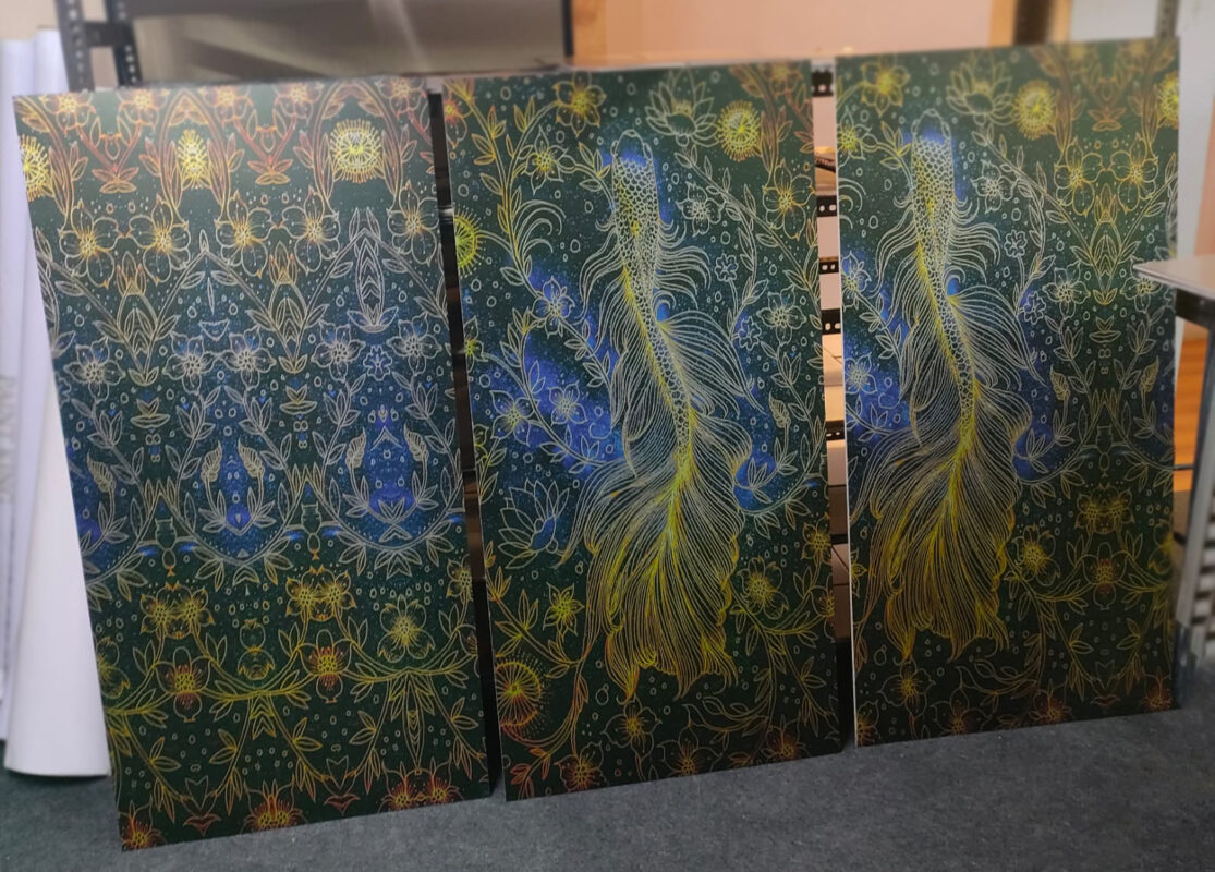 Three large ceramic tiles with a captivating floral and avian design, printed using UV digital printing technology