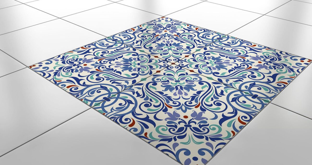 A square tile with a blue and white damask pattern.