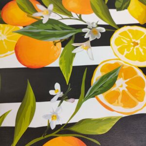 Vibrant pattern of oranges, lemons, leaves, and white flowers on a black and white striped background. this on leather.