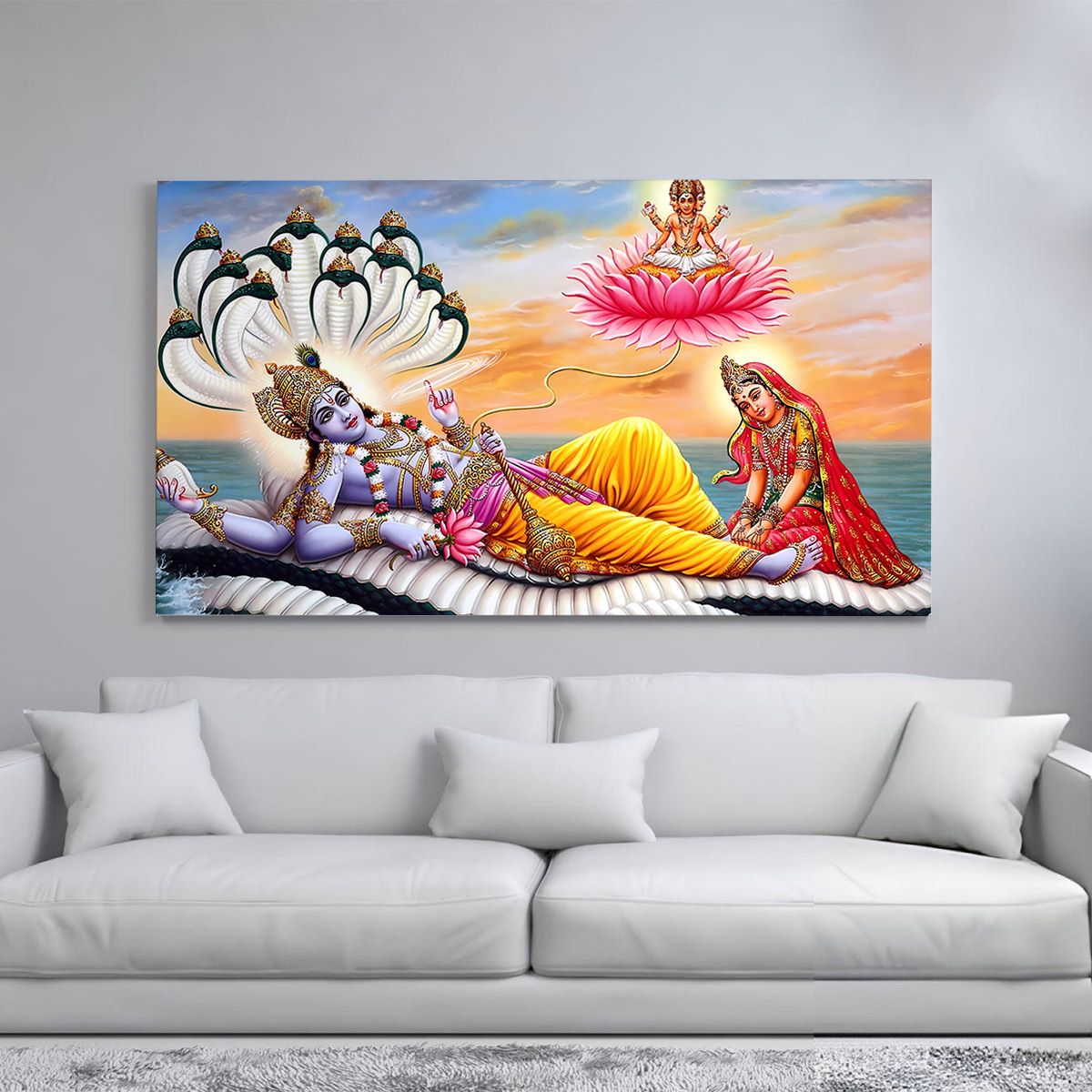 A canvas print of Lord Vishnu reclining on a serpent, with Lakshmi massaging his feet and Garuda standing nearby.